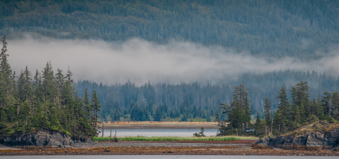 "Alaskan river and mountain with clouds" stock image