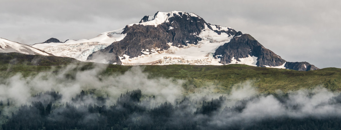 "Snow capped Alaskan mountain range" stock image