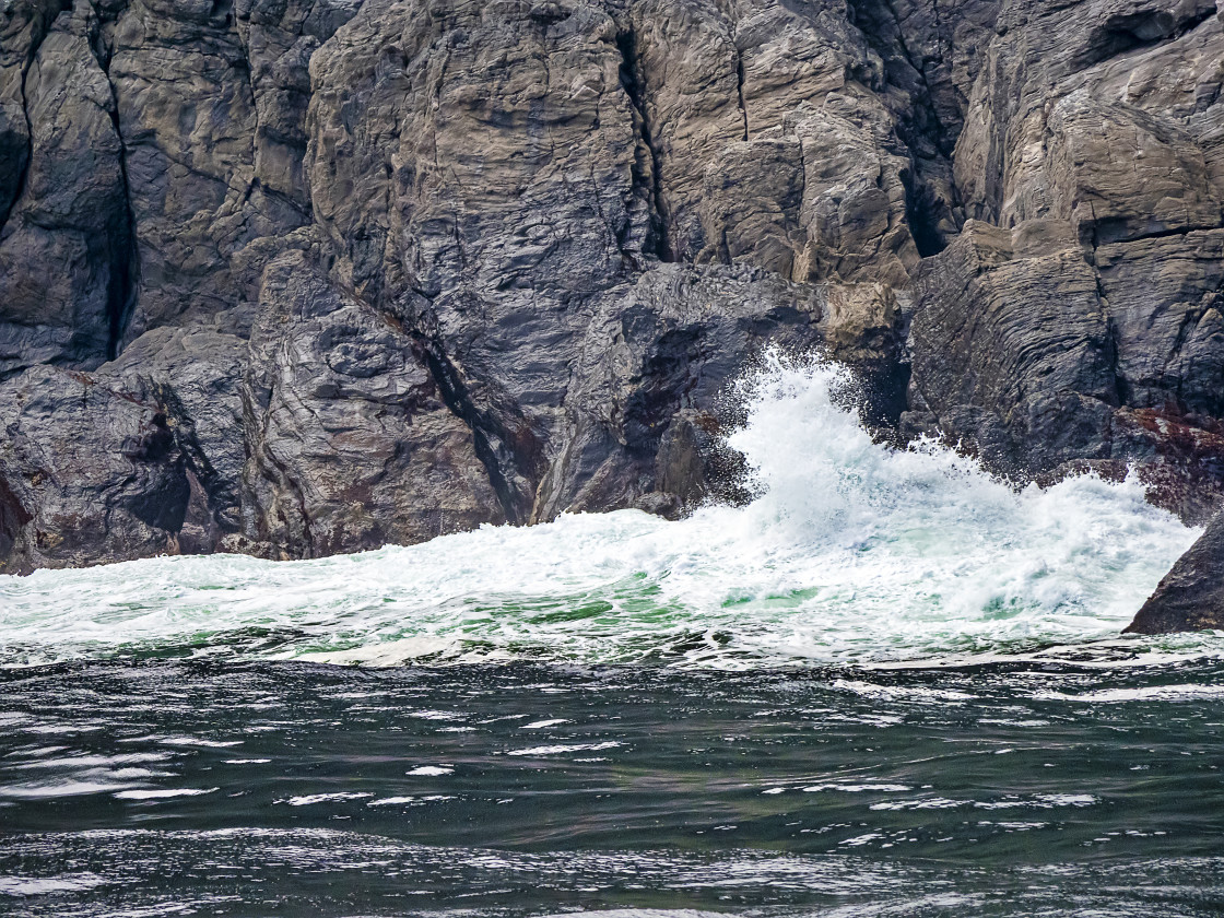 "Milford Sound - waves on rocks" stock image