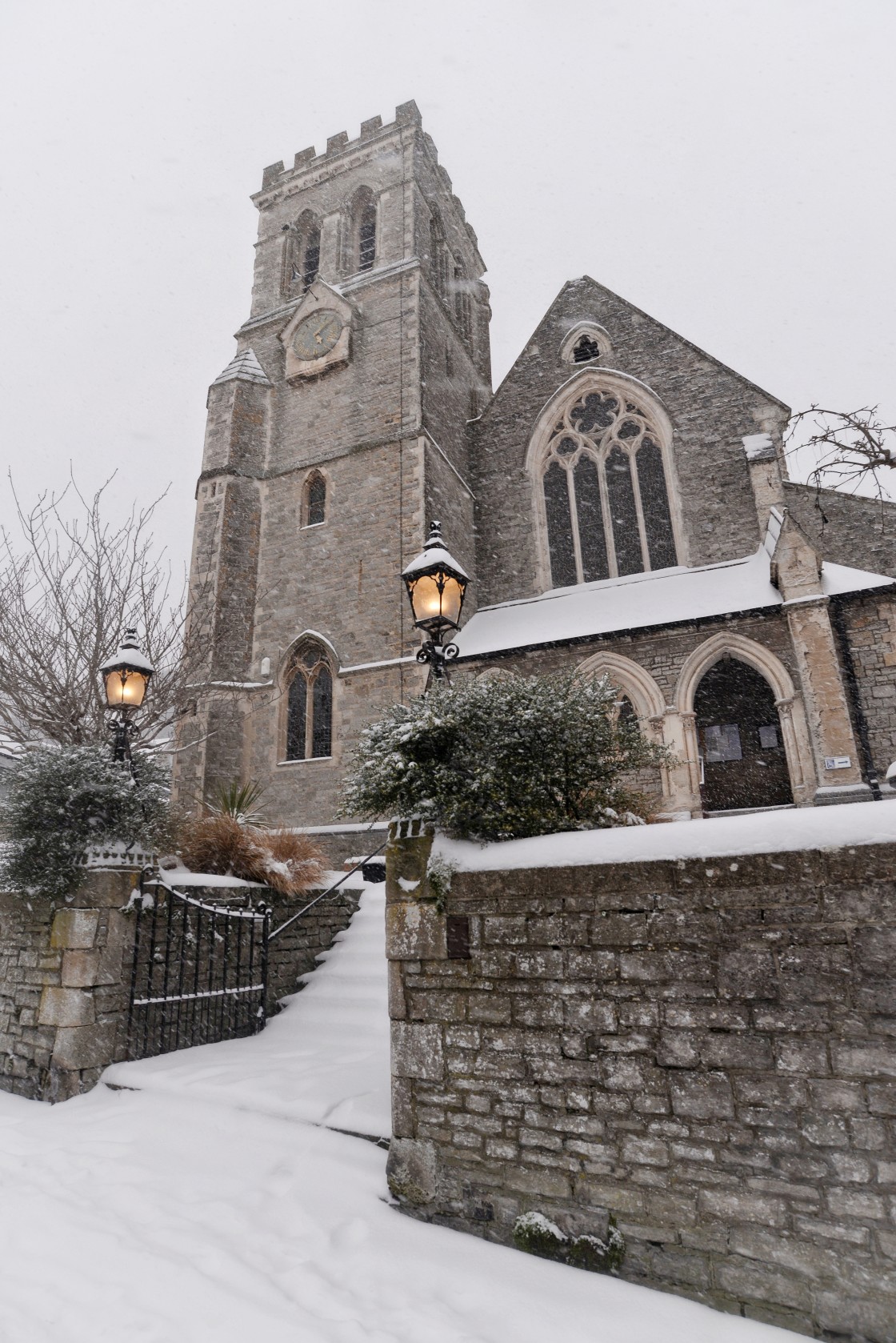 "St Michael's Church in the snow" stock image