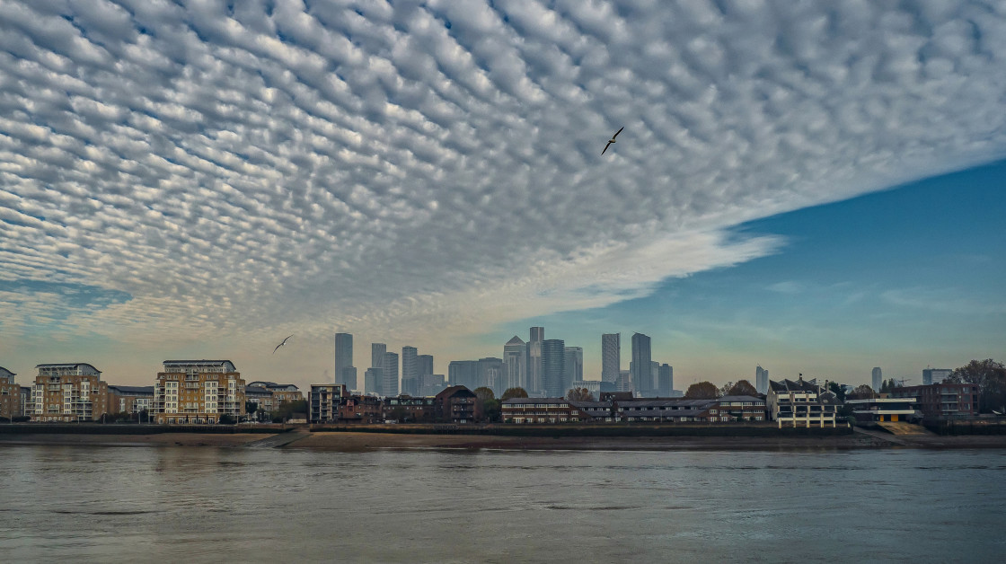 "Canary Wharf & The Mackerel Sky, London" stock image