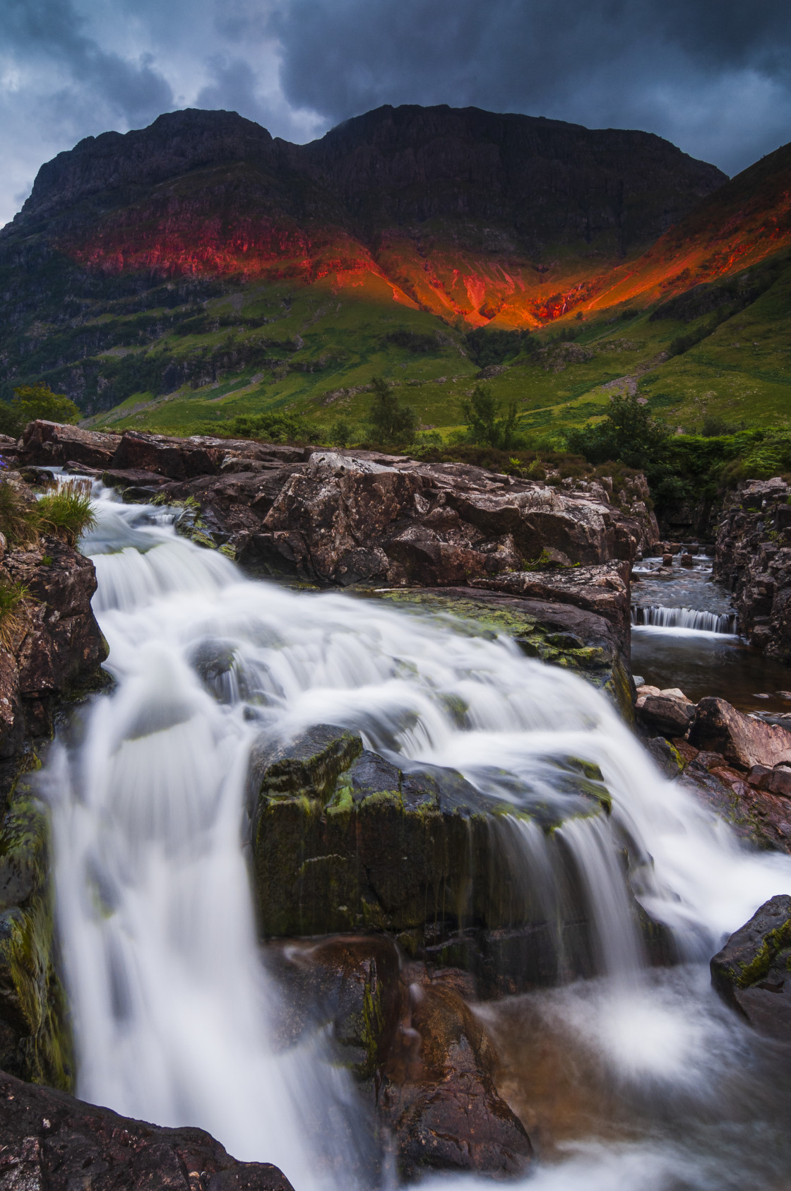 "Waterfall at sunset" stock image