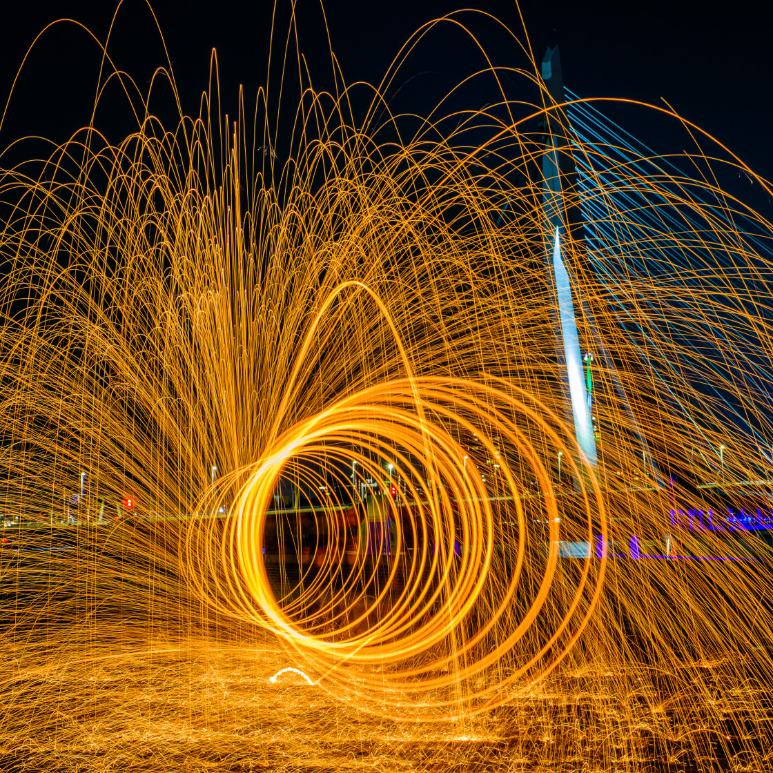 "RPS Night Photography Workshop with Patrick van Dijk. Steel wool in front of Erasmusbrug." stock image