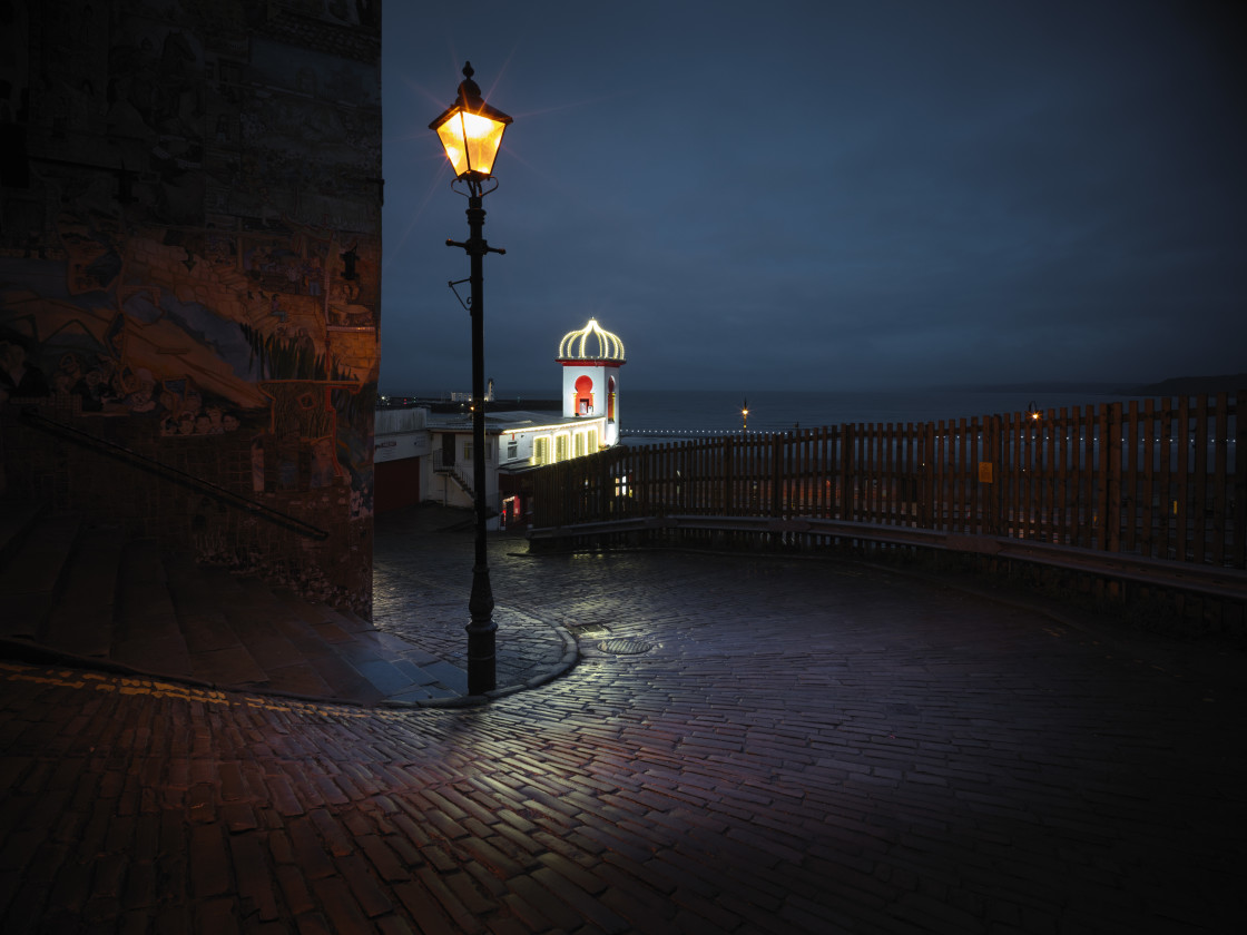 "The cobbles glowed in the street lights" stock image