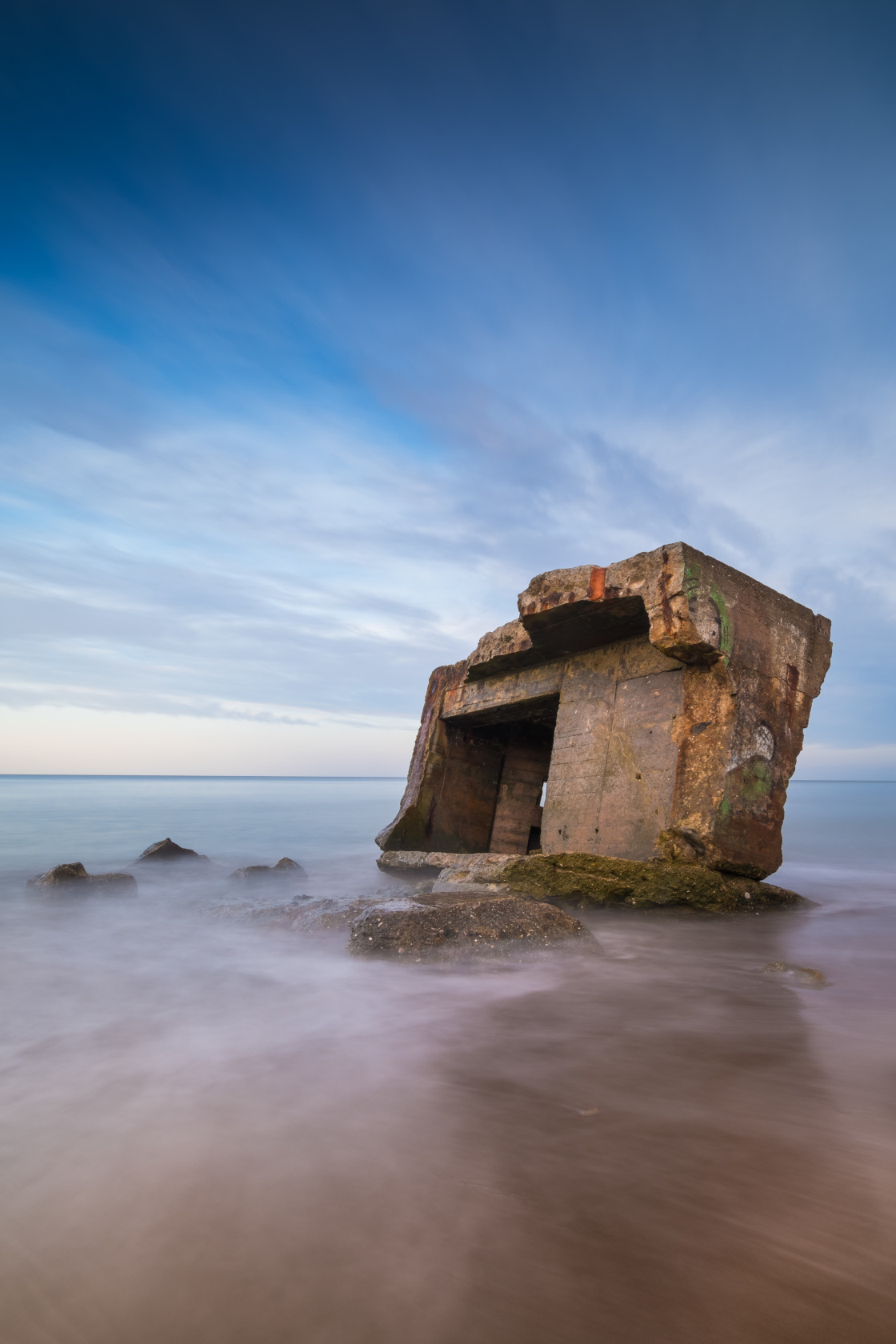 "Soft light over Cayton Bay pillbox" stock image