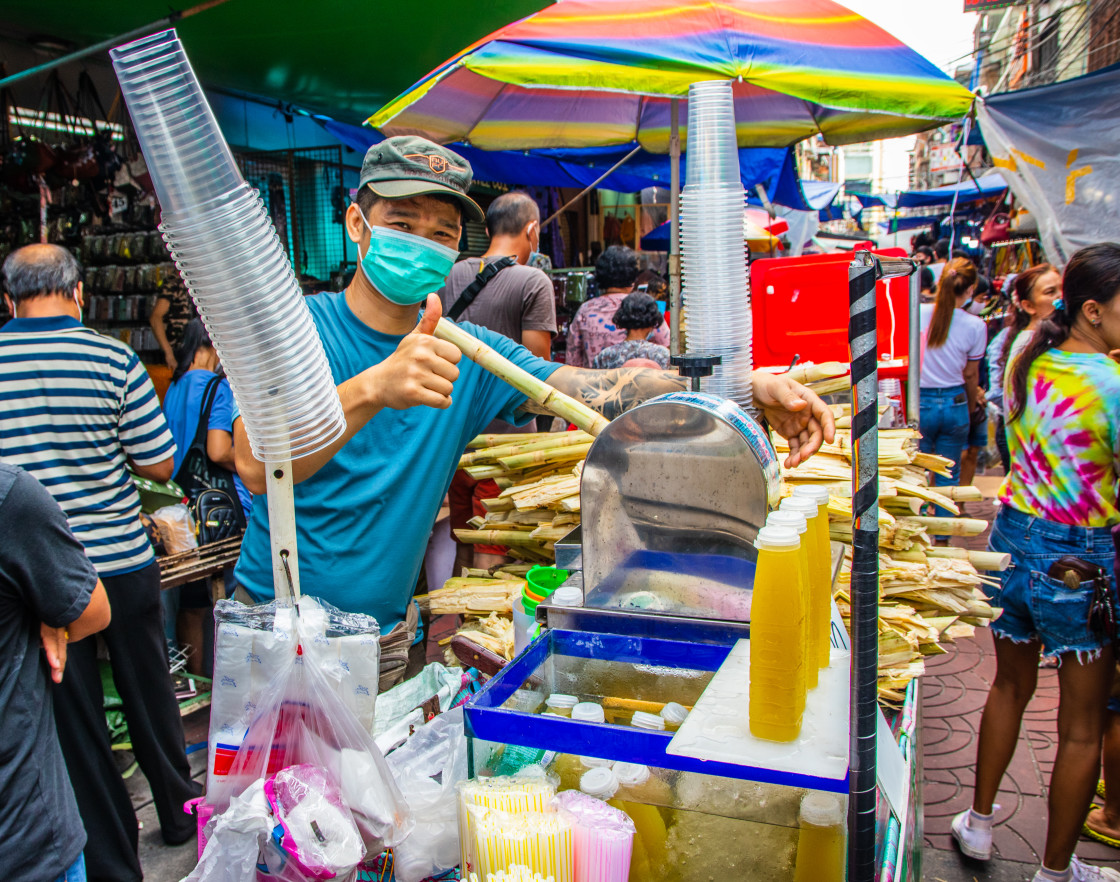 "Selling sugar cane juice at Sampeng Market Chinatown in Bangkok Asia" by Wilfried Strang - $14.76 "Selling sugar cane juice at Sampeng Market Chinatown in Bangkok Asia" stock image