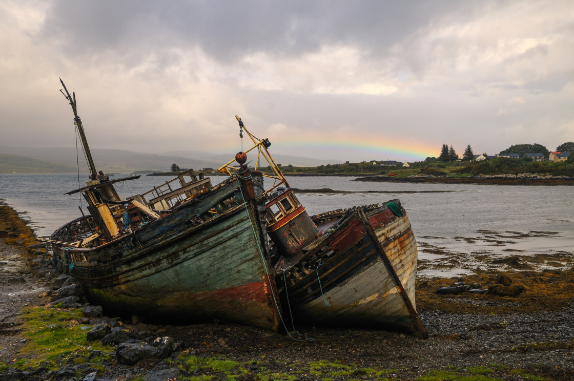 "Rainbow over boats at Salen, Isle of Mull" stock image