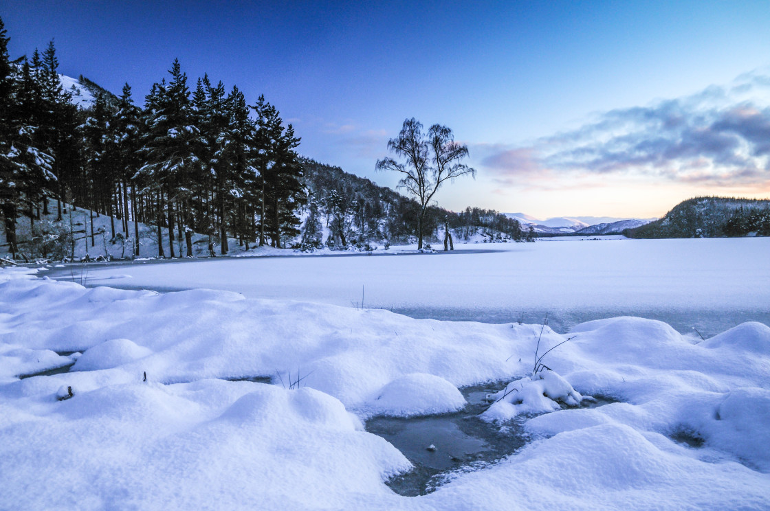 "Loch Pityoulish covered in snow" stock image