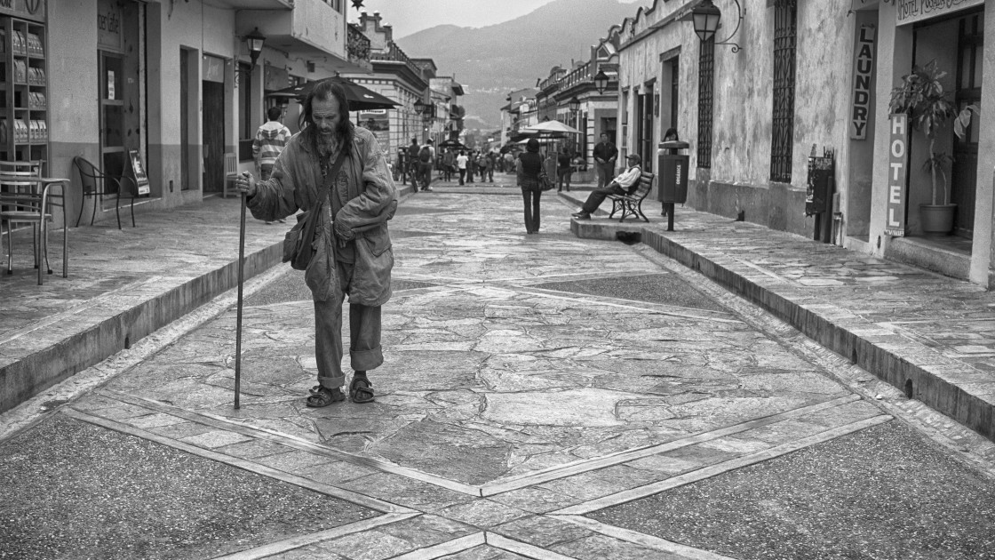 "Old man on walking street, San Cristobal, Mexico" stock image