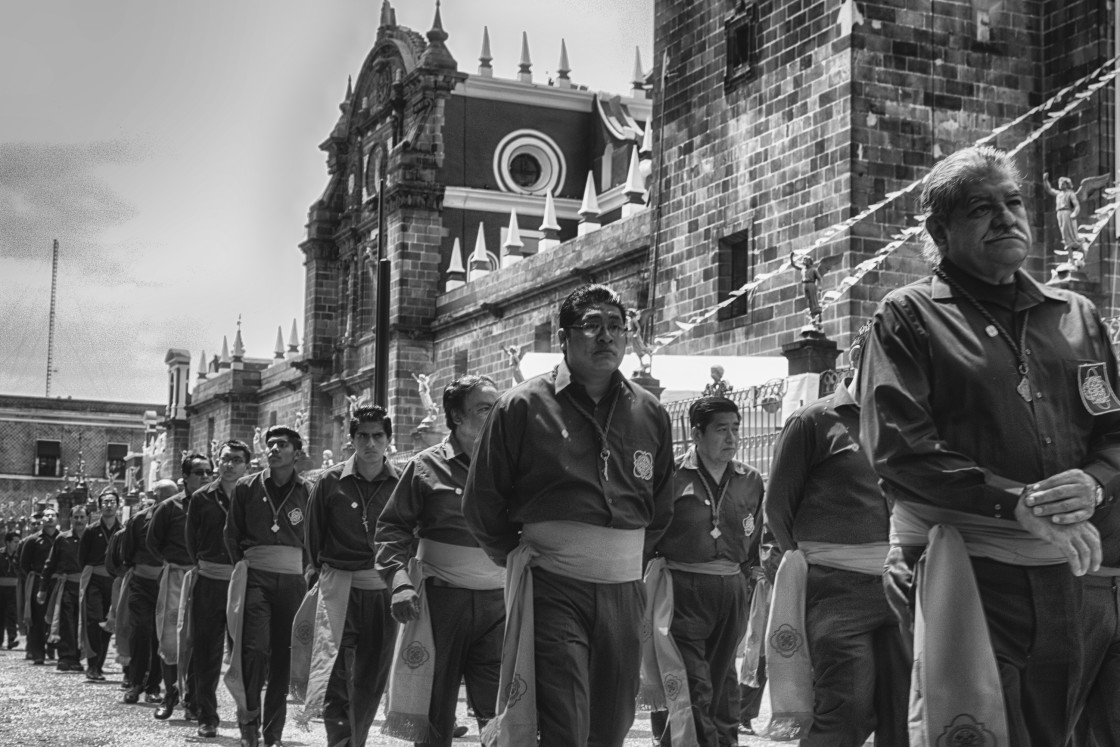 "Men marching in Parade for Semana Santa, Oaxaca, Mexico" stock image