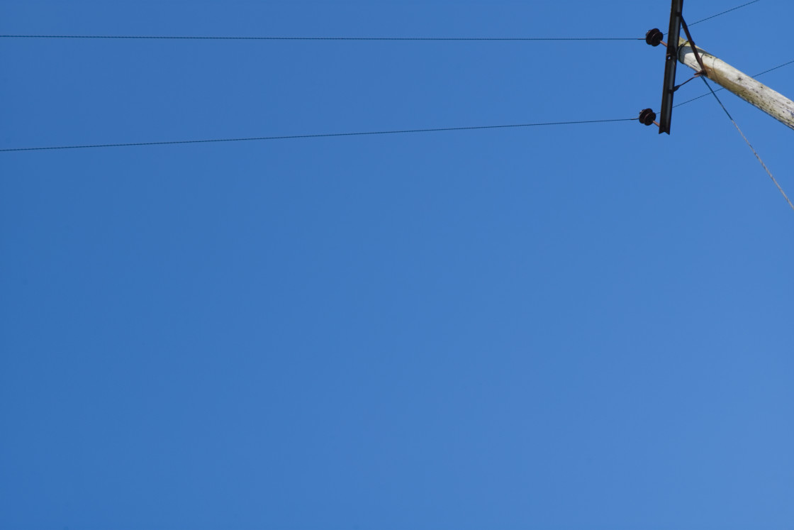 "Telephone wire looking up" stock image