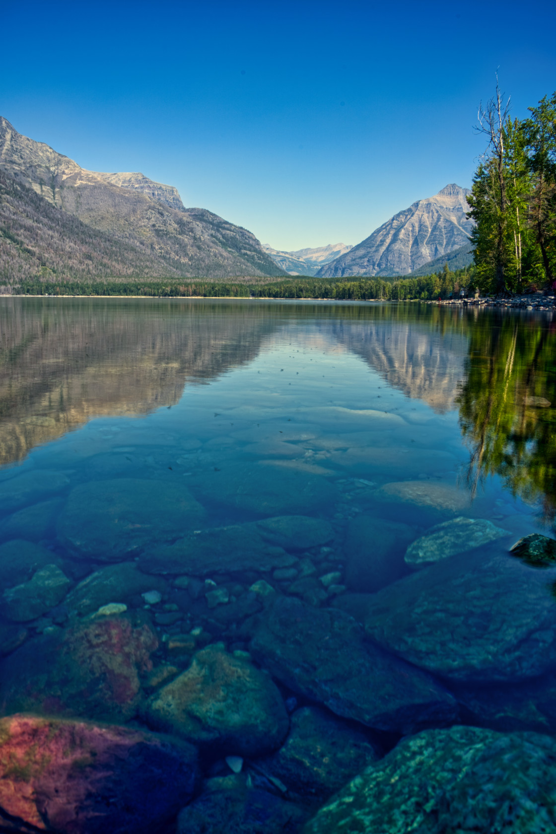 "McDonald Lake - Glacier National Park" by Spencer Ray Photos - $16.76 "McDonald Lake - Glacier National Park" stock image