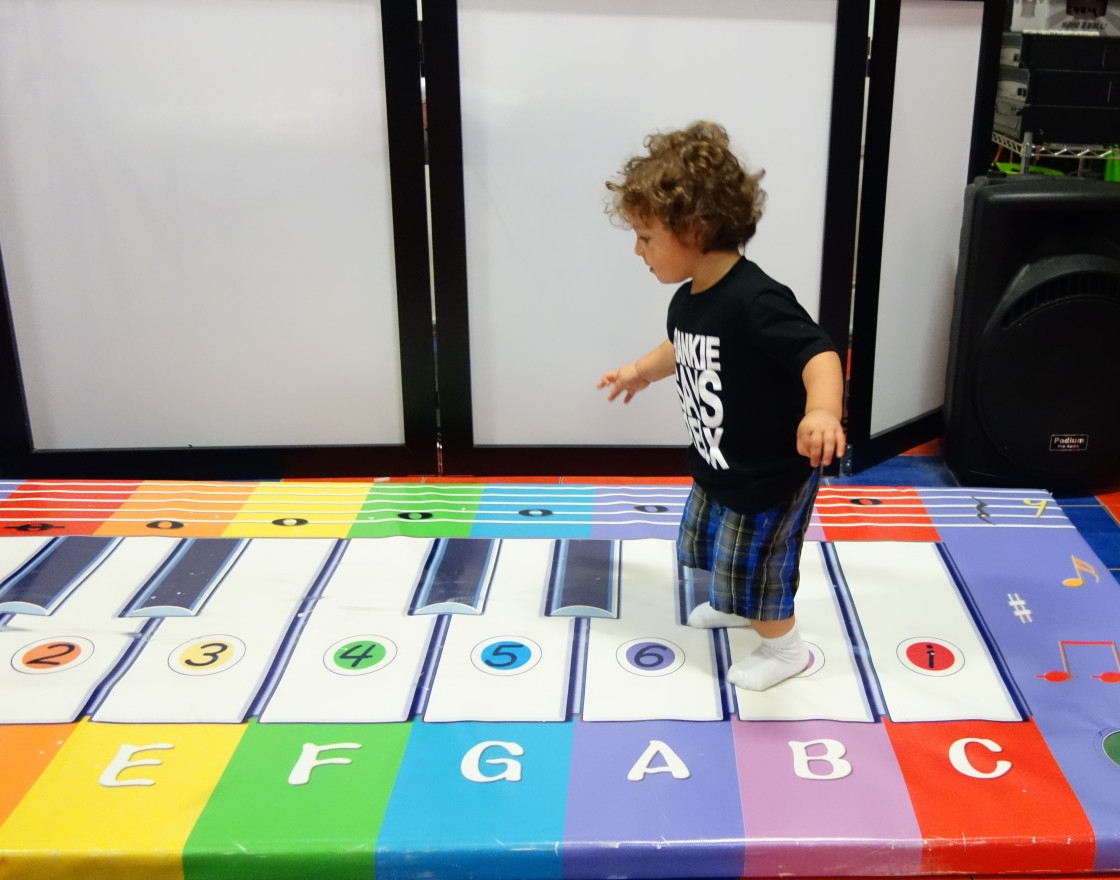 "Child Making Music" stock image