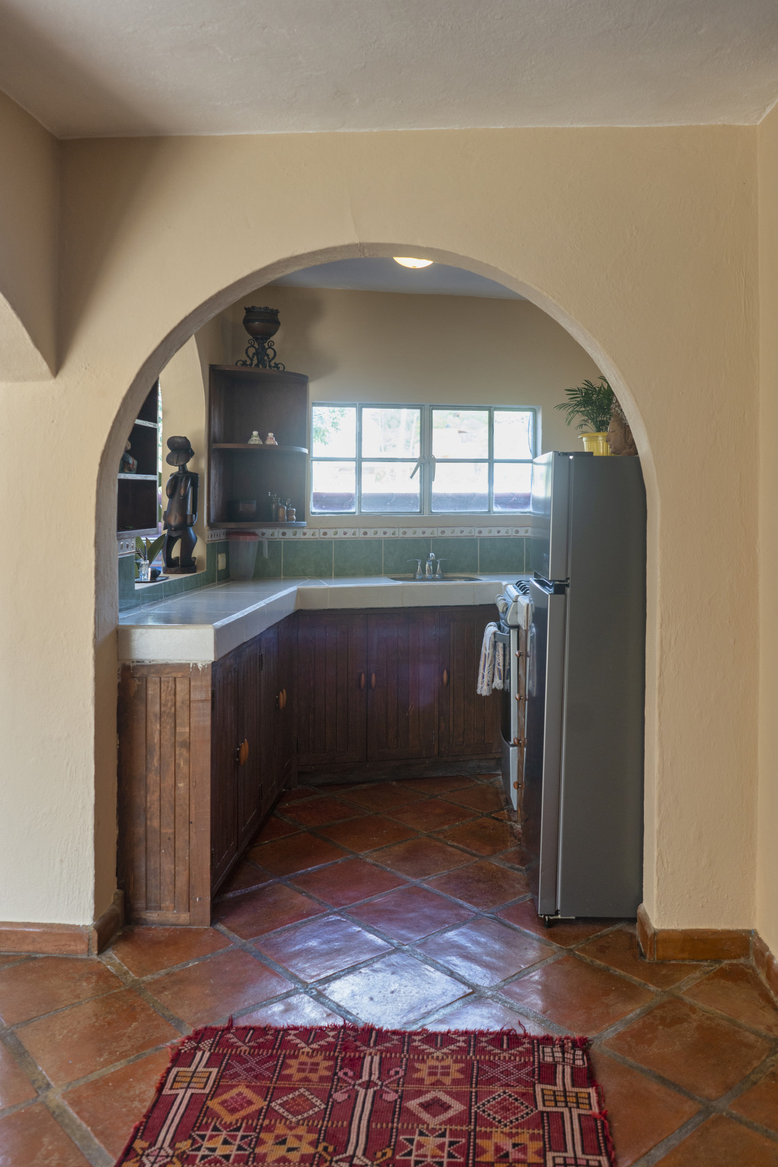 "kitchen through archway" stock image