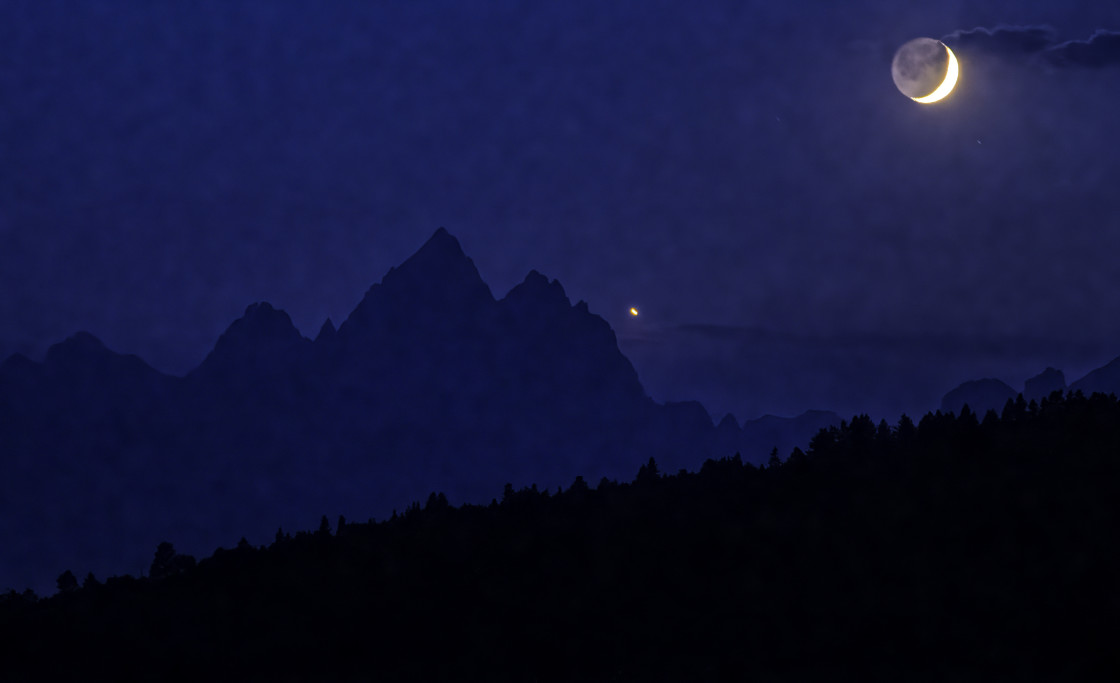 "Crescent Moon And Venus Over The Tetons" stock image