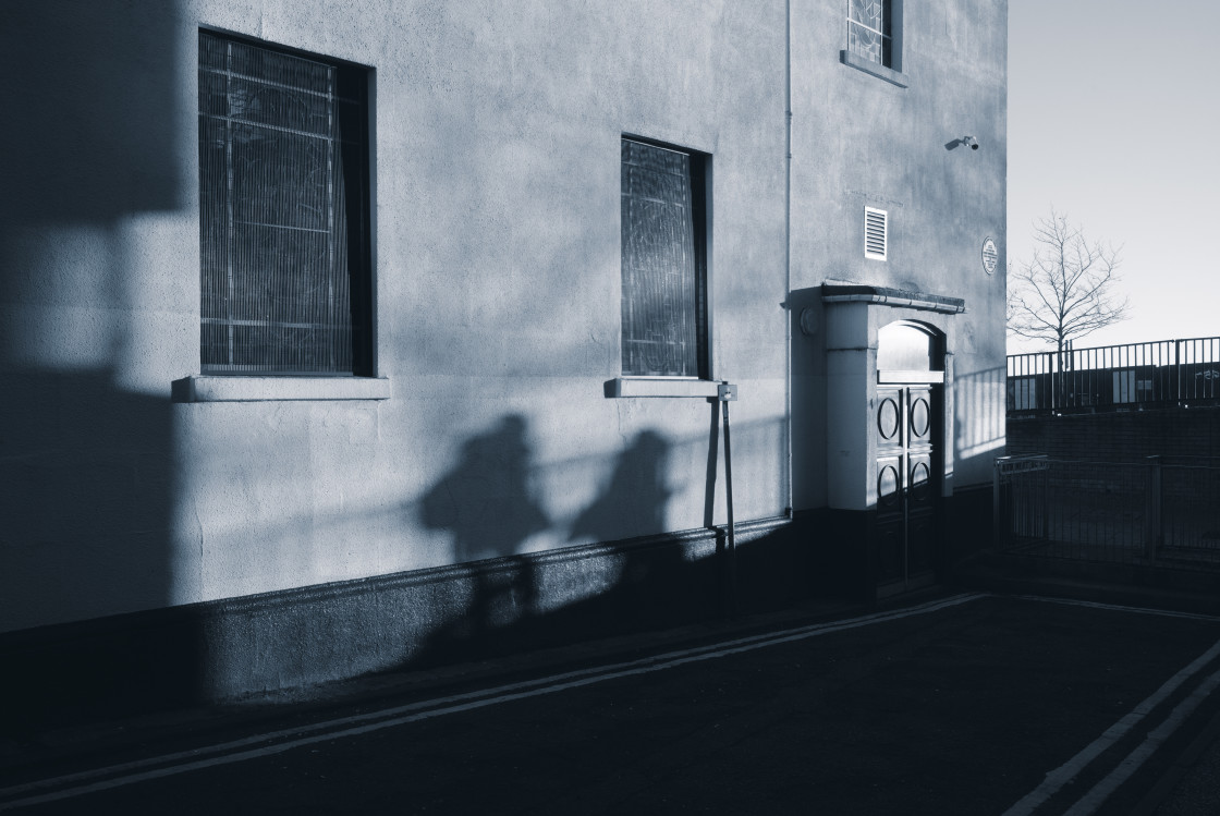 "Shadows of commuters" stock image