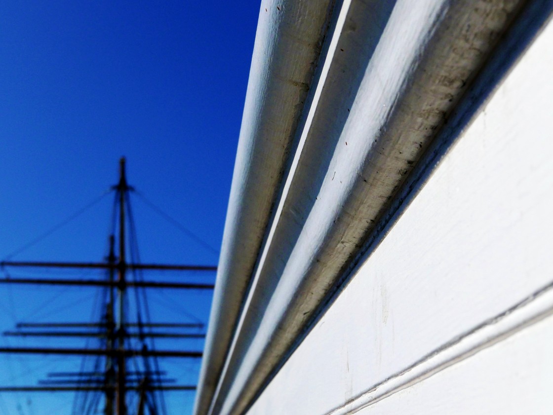 "Close-up of a white ships hull with mast out of focus, Maritime Museum, San Francisco." stock image