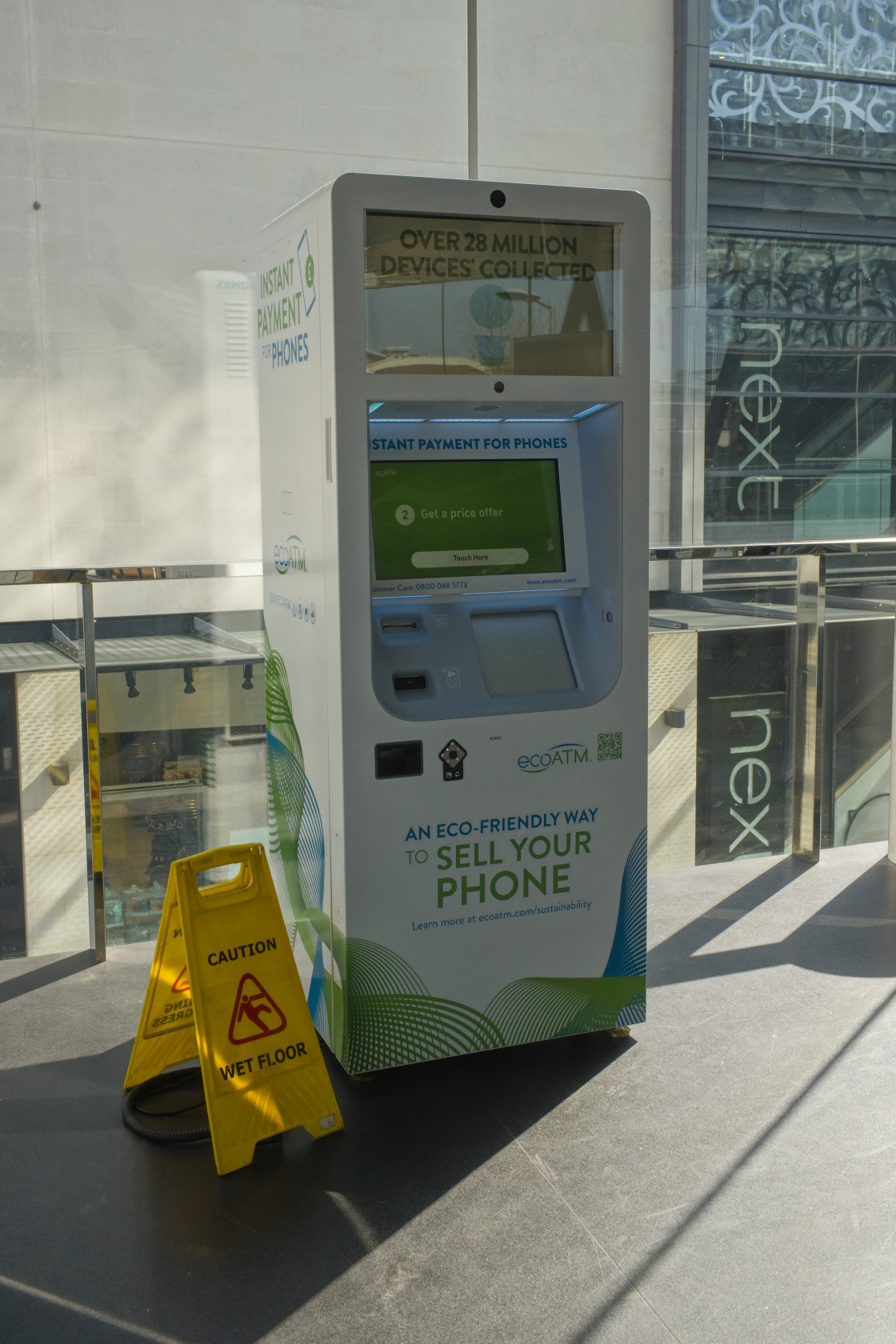 "Vending machine that buys old mobiles" stock image