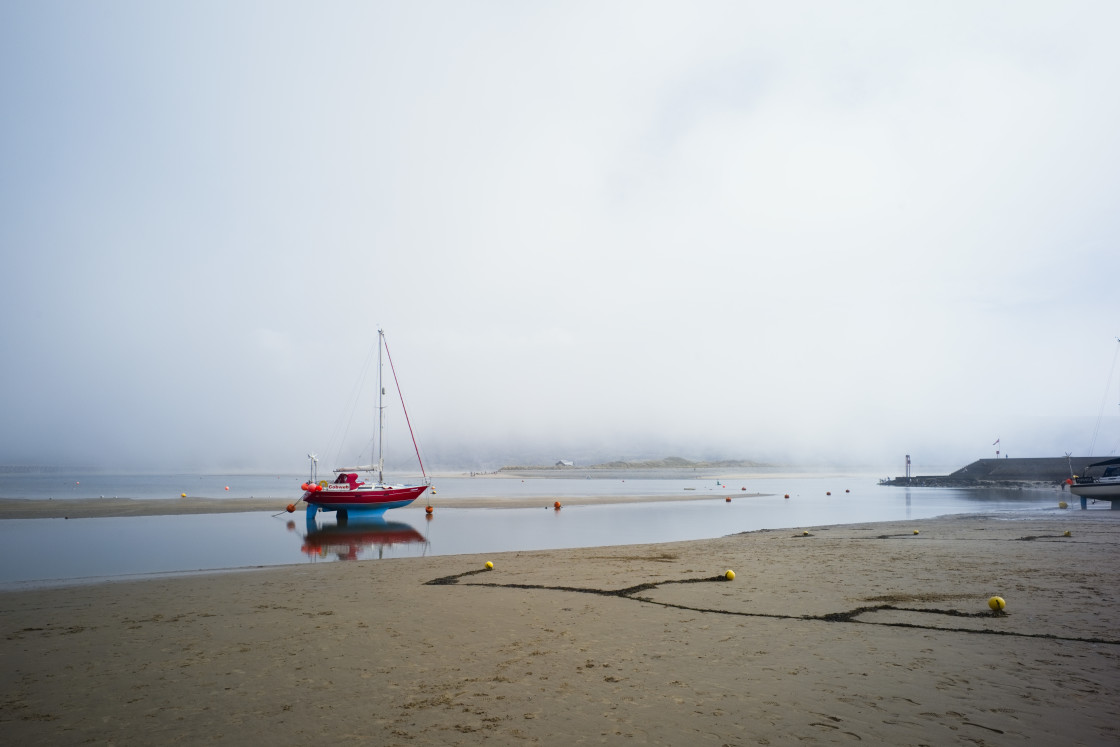 "Barmouth harbour at very low tide" stock image