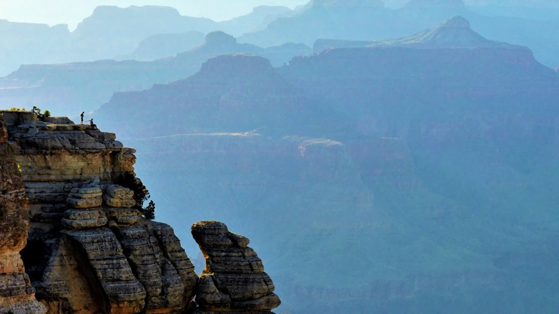 "Daredevils on a canyon edge at Grand Canyon National Park, AZ." stock image