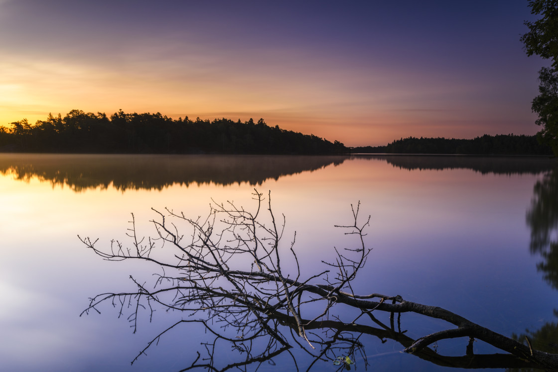 "Sunrise at still lake" stock image