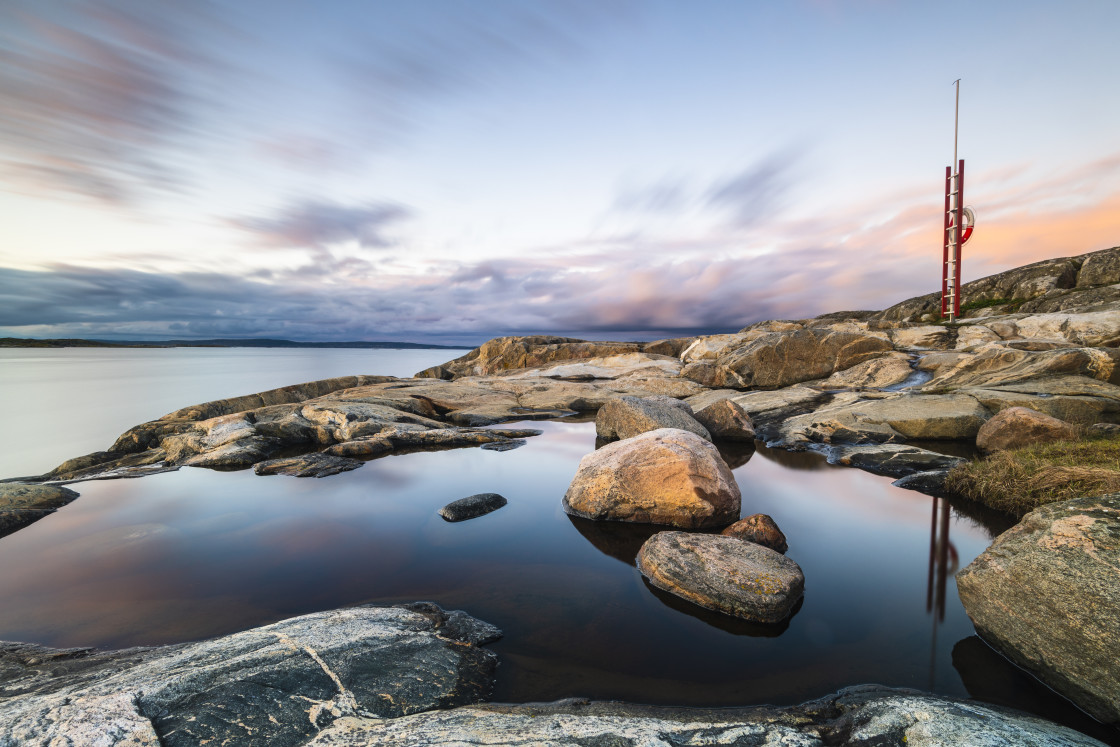 "Coastal scene at sunset, Sweden." stock image