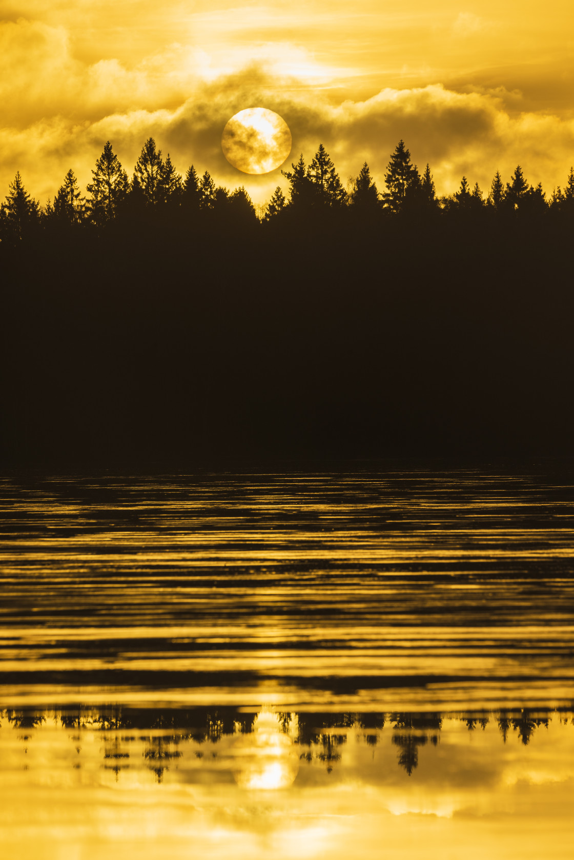 "Frozen lake in front of sunrise" stock image