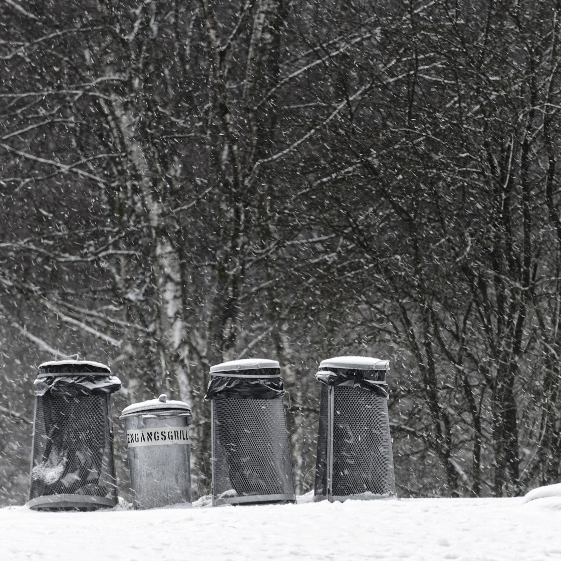 "Waste and litter bins in snowfall, Gothenburg, Sweden, Europe" stock image