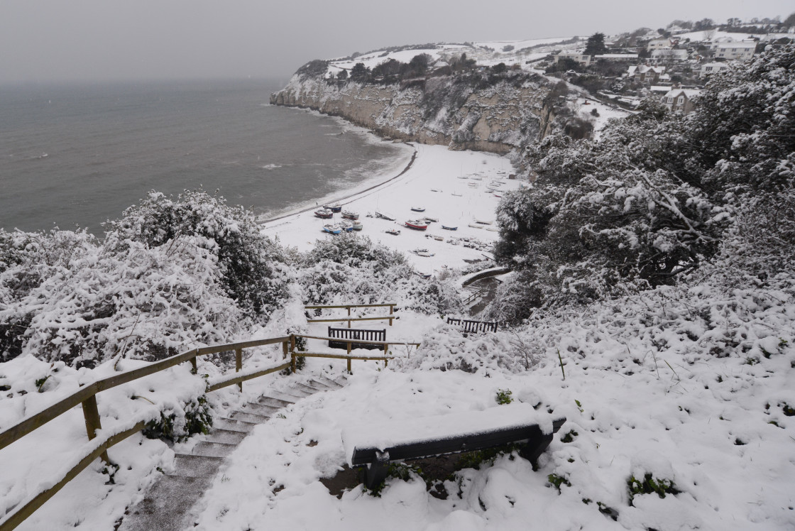 "Wintery view of Beer beach from the coast path." stock image