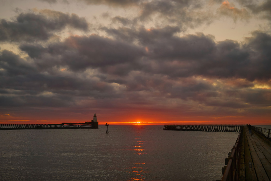 "Sunrise at the mouth of the River Blyth" stock image