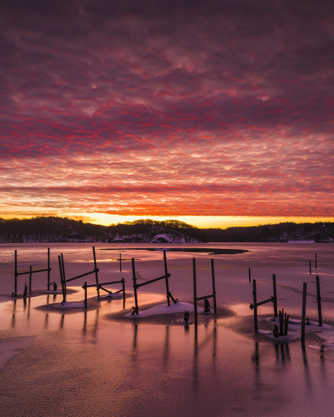 "Peaceful Sunrise on a Frozen Lake" stock image