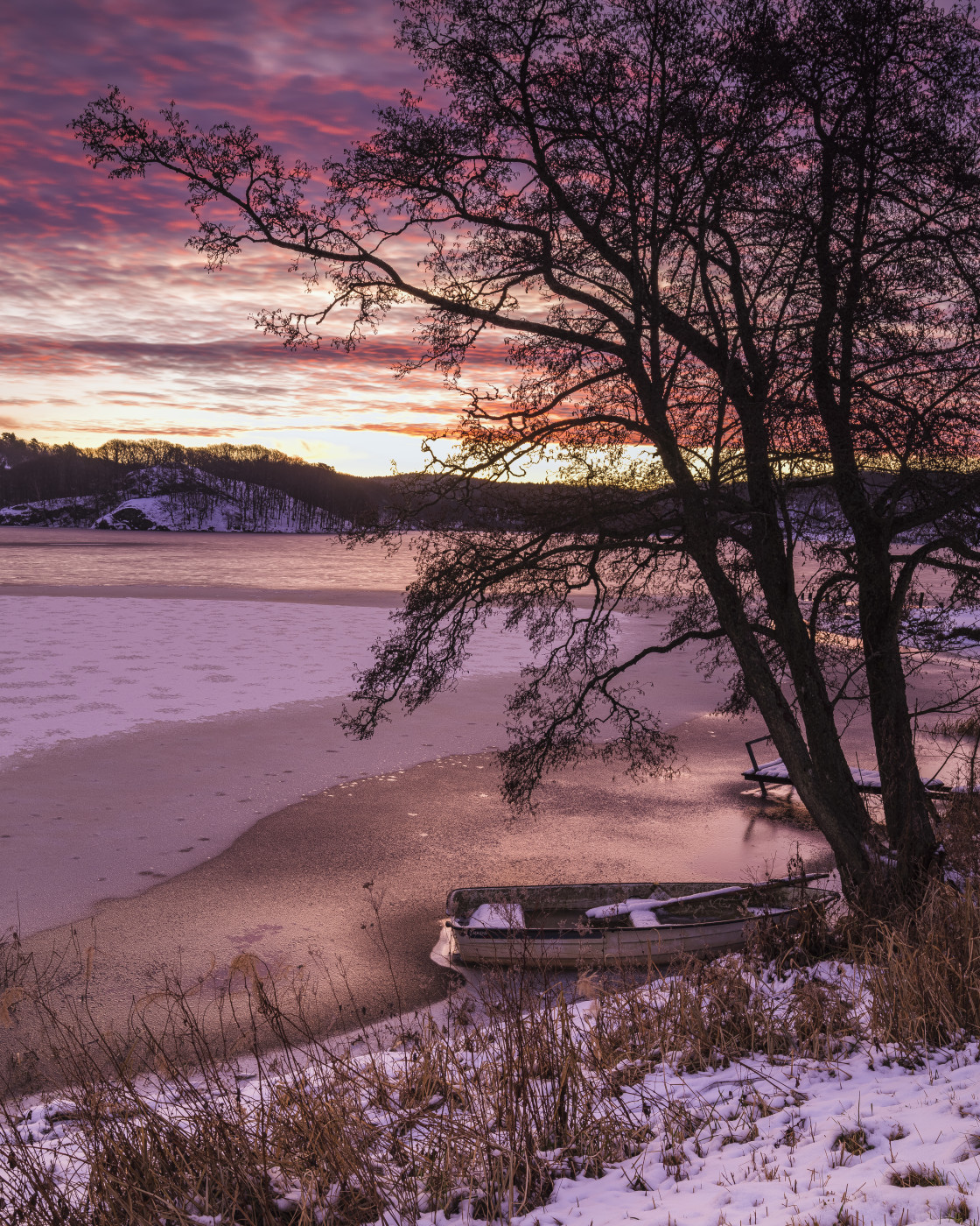 "Winter Sunrise over Icy Lake in Sweden." stock image