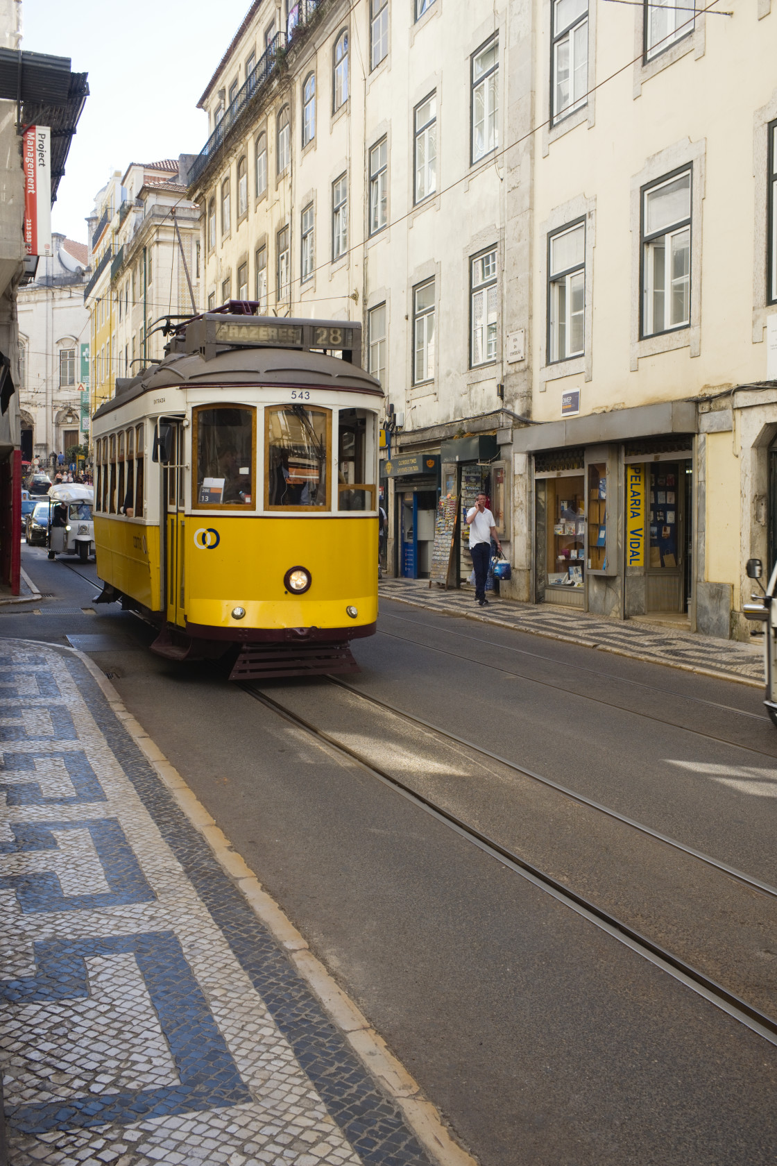 "Famous yellow and white number 28 tram on the Rua da Conceição" stock image