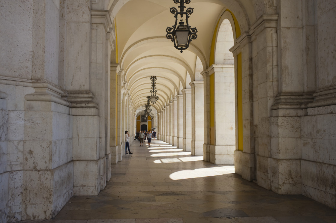 "Arched walkway at the Praça do Comércio" stock image