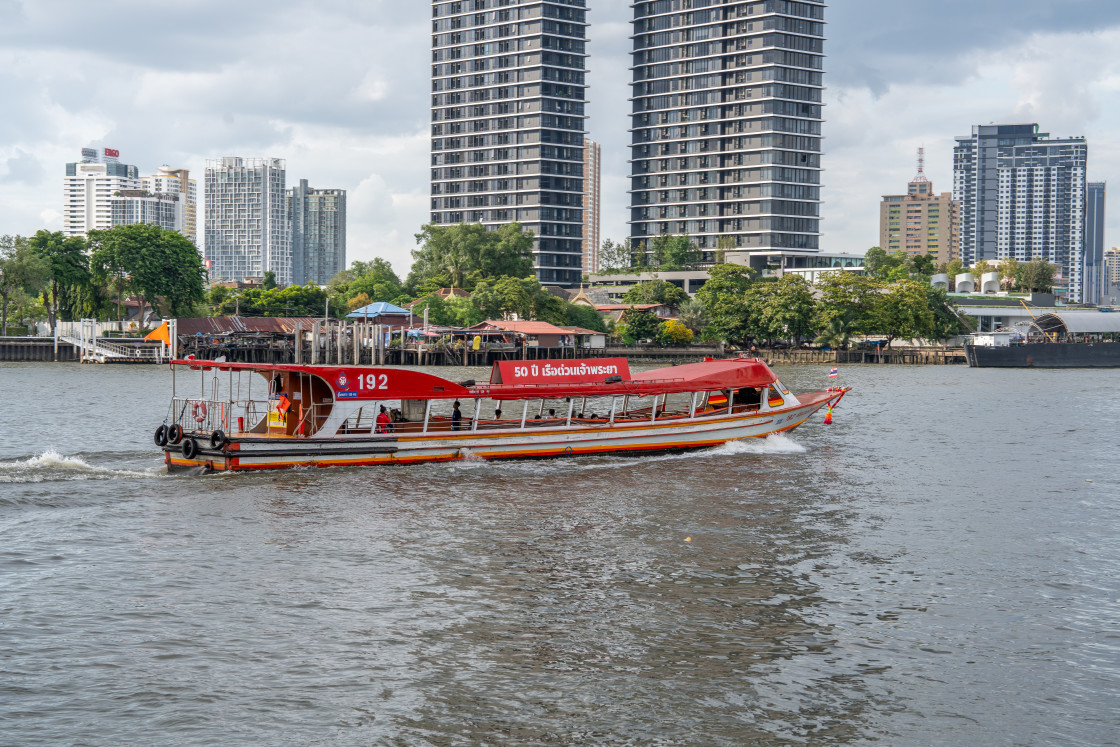 "An Express Boat or Transport Boat at the Chao Phraya River of Bangkok in Thailand Asia" stock image