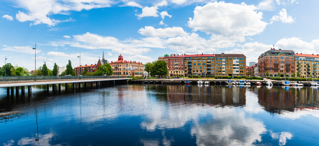 "Buildings at Halmstad city in front of still river, Sweden" stock image