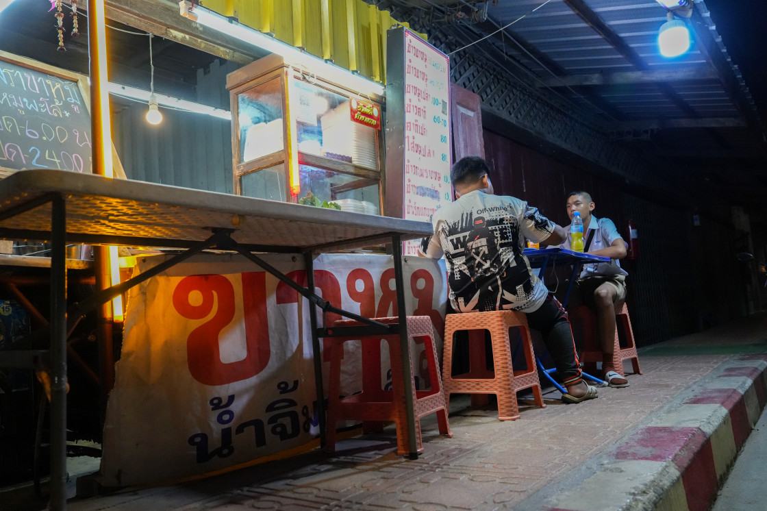 "Moments of street life with buildings and people in a street in the northern part of Pattaya district Chonburi in Thailand Asia" stock image