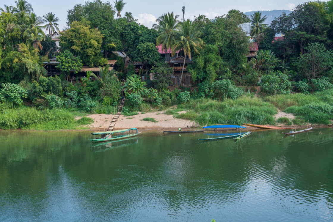 "The Nam Khan River, which flows into the Mekong River, is located in Luang Prabang, Laos, Asia." stock image