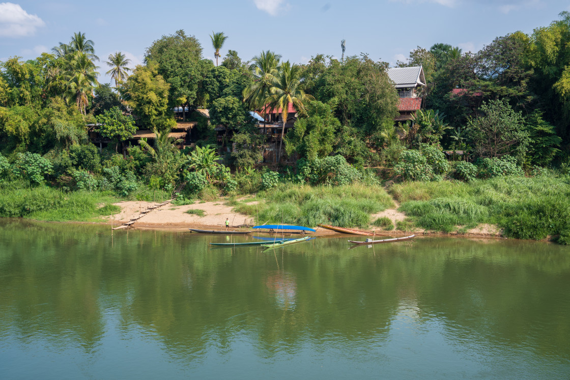 "The Nam Khan River, which flows into the Mekong River, is located in Luang Prabang, Laos, Asia." stock image