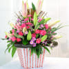 Media 1 - Pink and Purple bouquet in container