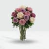 Media 1 - 12 Pink and Purple roses in a vase