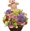 Media 1 - Arrangement of cut flowers with Teddy Bear