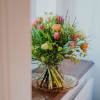 Media 2 - Bouquet de tulipes multicolores avec carte cadeau Orell Füssli CHF 25.-