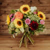 Media 2 - Bouquet autunnale con fiori svizzeri e cofanetto regalo Honey & Sweet di Bee-Family & Gottlieber