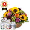 Media 1 - Arrangement d'automne avec des fleurs suisses et coffret cadeau de thés Gottlieber