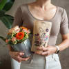 Media 2 - Arrangement floral «Good Feeling» avec des noix stoli – Fleurop Edition