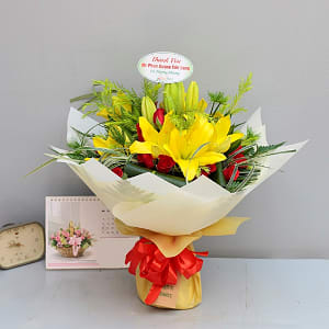 Media 1 - Yellow lilies with red and green