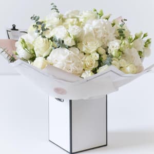 Media 1 - Beautifully Simple Showstopper White Flower Bouquet.