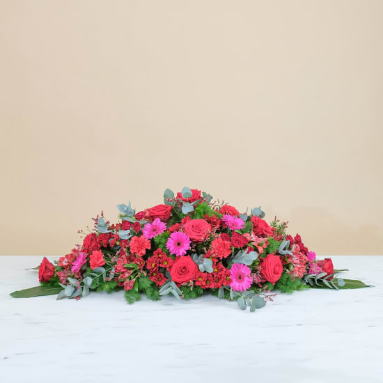Coffin cover with red roses