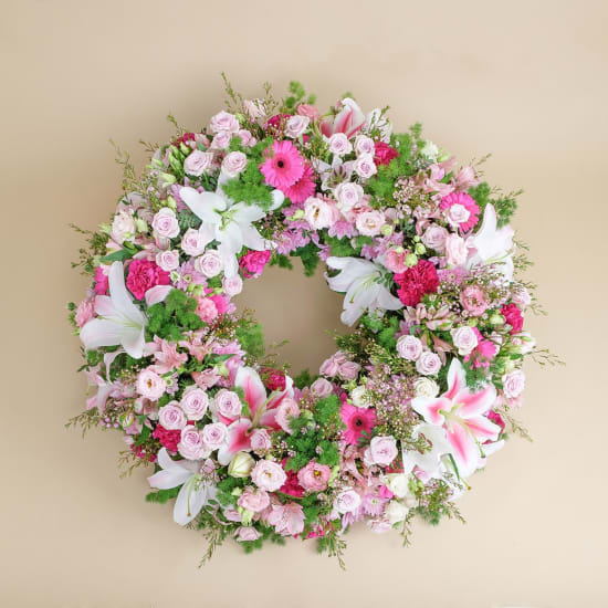 Small premium funeral wreath in shades of pink